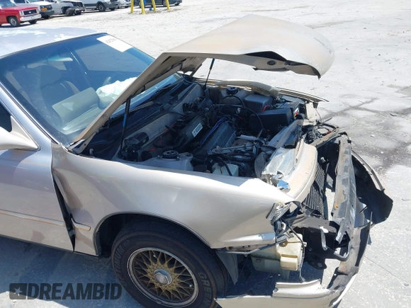 1995 Toyota Camry LE z VIN 4T1SK12E8SU872841, wystawiony jako IAAI lot #42025861 z przebiegiem 228 747 mil mil oraz . Historia ofert i sprzedaży dostępna na DreamBid. Obrazek 12.