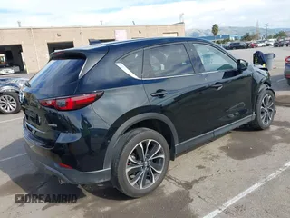 2023 Mazda CX-5 2.5 S Premium Package with VIN JM3KFBDM4P0266378, listed as a IAAI auction lot 41655712 with 31,746 mi miles. Bid and sale history available at carsss.com. Image 4.
