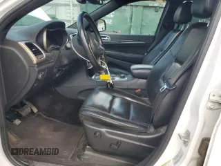 2016 Jeep Grand Cherokee Limited 75th Anniversary with VIN 1C4RJFBT6GC436472, listed as a Copart auction lot 53052795 with 223,570 mi miles and Salvage Title. Bid and sale history available at DreamBid. Image 7.