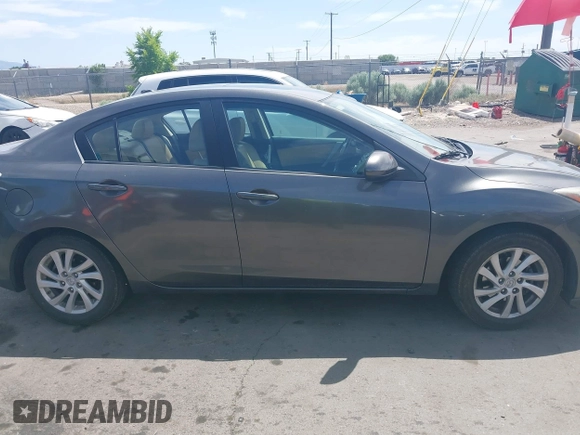2012 Mazda 3 i Grand Touring with VIN JM1BL1W8XC1577118, listed as a IAAI auction lot 42349406 with 107,373 mi miles and . Bid and sale history available at DreamBid. Image 13.