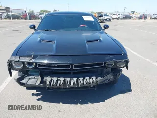 2016 Dodge Challenger SXT Plus z VIN 2C3CDZAG4GH184435, wystawiony jako IAAI lot #42162973 z przebiegiem 168 495 mil mil oraz . Historia ofert i sprzedaży dostępna na DreamBid. Obrazek 6.