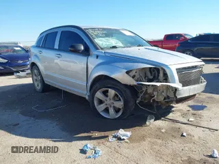 2010 Dodge Caliber SXT with VIN 1B3CB4HA4AD619143, listed as a IAAI auction lot 41694631 with 172,657 mi miles and . Bid and sale history available at DreamBid. Image 1.