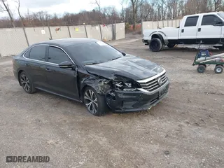 2021 Volkswagen Passat 2.0T SE with VIN 1VWSA7A34MC019031, listed as a IAAI auction lot 41150221 with 50,796 mi miles. Bid and sale history available at carsss.com. Image 1.