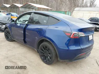 2025 Tesla Model Y Long Range with VIN 7SAYGDED9SF248370, listed as a IAAI auction lot 41336869 with 2,499 mi miles and . Bid and sale history available at DreamBid. Image 3.