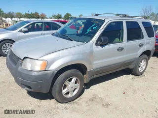 2003 Ford Escape XLT Popular with VIN 1FMYU03103KC87839, listed as a IAAI auction lot 41831997 with 241,204 mi miles. Bid and sale history available at carsss.com. Image 2.