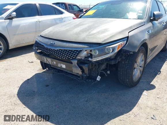 2016 Kia Optima EX with VIN 5XXGU4L31GG106854, listed as a IAAI auction lot 41762052 with 122,121 mi miles. Bid and sale history available at carsss.com. Image 6.