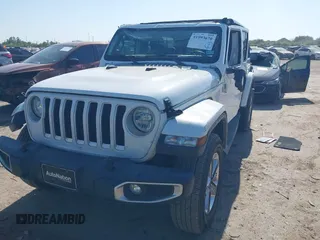 2019 Jeep Wrangler Unlimited Sahara with VIN 1C4HJXEG0KW577917, listed as a IAAI auction lot 41993670 with 90,584 mi miles and . Bid and sale history available at DreamBid. Image 17.
