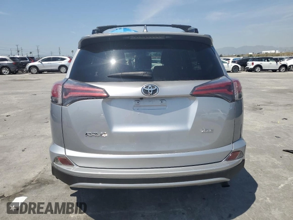 2018 Toyota RAV4 XLE with VIN JTMWFREV1JD119879, listed as a Copart auction lot 52236135 with 79,897 mi miles and Salvage Title. Bid and sale history available at carsss.com. Image 6.