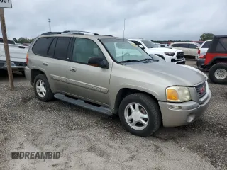 2003 GMC Envoy SLE with VIN 1GKDS13S932170188, listed as a Copart auction lot 82027964 with 266,978 mi miles and Clean Title. Bid and sale history available at carsss.com. Image 4.