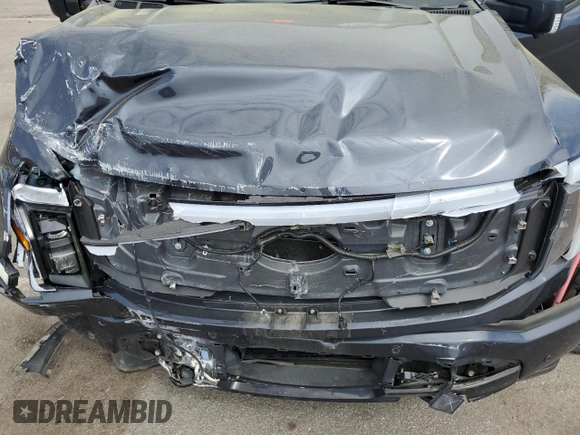 2022 Ford F-150 Lightning Pro z VIN 1FT6W1EV7NWG10601, wystawiony jako Copart lot #55057445 z przebiegiem Nie podano mil oraz Szkoda całkowita • Salvage title. Historia ofert i sprzedaży dostępna na DreamBid. Obrazek 11.