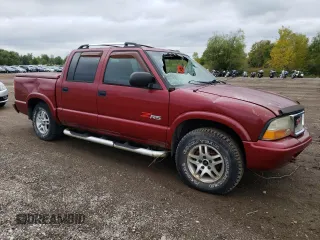 2002 GMC Sonoma SLS with VIN 1GTDT13W62K203061, listed as a Copart auction lot 83095774 with 136,118 mi miles and Salvage Title. Bid and sale history available at carsss.com. Image 4.