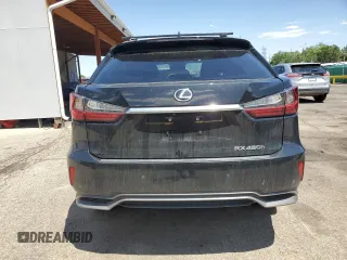 2019 Lexus RX 450h with VIN 2T2BGMCA3KC037404, listed as a Copart auction lot 61683875 with 76,316 mi miles and Salvage title. Bid and sale history available at DreamBid. Image 6.