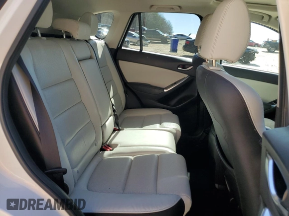 2016 Mazda CX-5 Grand Touring with VIN JM3KE4DY6G0857197, listed as a Copart auction lot 44500955 with 76,088 mi miles and Salvage Title. Bid and sale history available at DreamBid. Image 11.