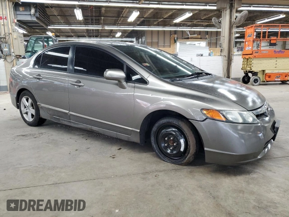 2006 Honda Civic LX with VIN 1HGFA16516L051998, listed as a Copart auction lot 47038345 with 166,496 mi miles and Salvage Title. Bid and sale history available at DreamBid. Image 4.