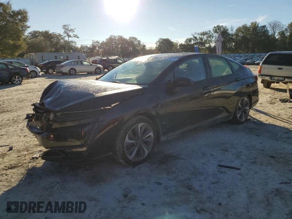 2018 Honda Clarity Plug-In Hybrid with VIN JHMZC5F13JC014047, listed as a Copart auction lot 82605013 with 58,717 mi miles. Bid and sale history available at carsss.com. Image 1.