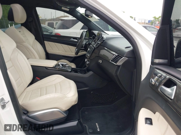 2017 Mercedes-Benz GLS 63 AMG with VIN 4JGDF7FE7HA893426, listed as a IAAI auction lot 42313142 with 68,283 mi miles and . Bid and sale history available at DreamBid. Image 5.