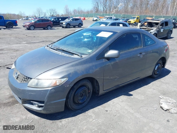 2010 Honda Civic Cpe LX with VIN 2HGFG1B63AH535237, listed as a IAAI auction lot 42070132 with 190,944 mi miles. Bid and sale history available at carsss.com. Image 2.
