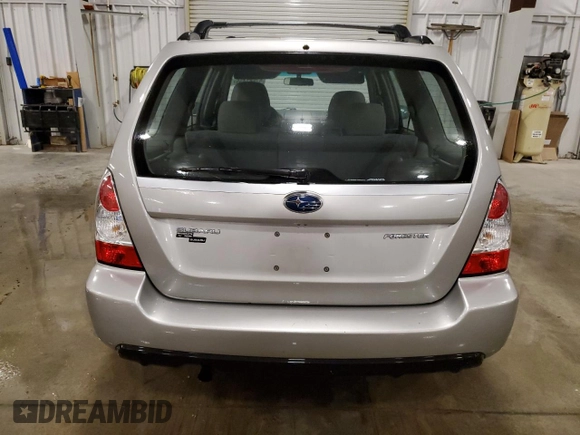 2007 Subaru Forester X с VIN JF1SG63657H743486, выставлен на аукционе Copart как лот 57681455 с пробегом 57 863 миль миль и Списание • Salvage title. История ставок и продаж доступна на DreamBid. Изображение 6.