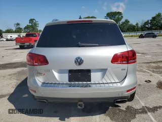 2014 Volkswagen Touareg Lux with VIN WVGEF9BP1ED012267, listed as a Copart auction lot 58924055 with 81,009 mi miles and Salvage title. Bid and sale history available at DreamBid. Image 6.