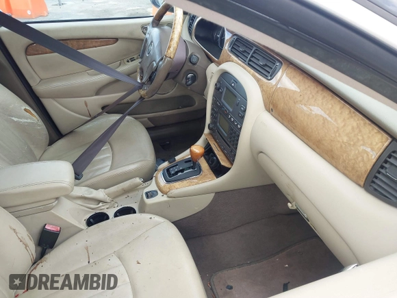 2004 Jaguar X-Type with VIN SAJEA51C44WD56659, listed as a IAAI auction lot 41712395 with Not Provided miles and . Bid and sale history available at DreamBid. Image 5.