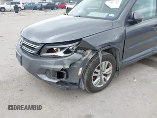 2012 Volkswagen Tiguan SE with VIN WVGAV7AX8CW004451, listed as a IAAI auction lot 42287717 with 110,167 mi miles and . Bid and sale history available at DreamBid. Image 6.