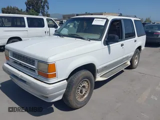 1994 Ford Explorer Eddie Bauer z VIN 1FMDU34X4RUB96329, wystawiony jako IAAI lot #42105903 z przebiegiem 52 719 mil mil oraz . Historia ofert i sprzedaży dostępna na DreamBid. Obrazek 6.
