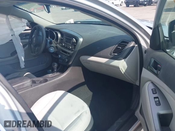 2015 Kia Optima LX with VIN 5XXGM4A75FG378795, listed as a IAAI auction lot 42604014 with 57,199 mi miles and . Bid and sale history available at DreamBid. Image 5.