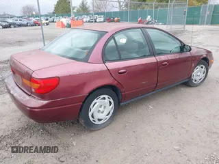 2001 Saturn SL with VIN 1G8ZK52731Z272462, listed as a IAAI auction lot 41717491 with 185,299 mi miles and . Bid and sale history available at DreamBid. Image 4.