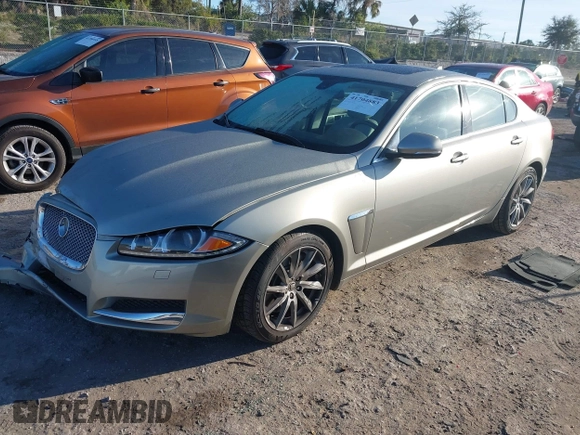 2013 Jaguar XF I4 RWD with VIN SAJWA0ES3DPU01767, listed as a IAAI auction lot 41704883 with 54,797 mi miles. Bid and sale history available at carsss.com. Image 2.