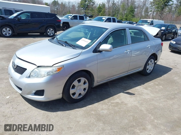 2010 Toyota Corolla with VIN 2T1BU4EEXAC298637, listed as a IAAI auction lot 42036415 with 103,885 mi miles. Bid and sale history available at carsss.com. Image 2.
