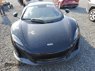 2015 McLaren 650S z VIN SBM11FAA3FW004388, wystawiony jako Copart lot #74802864 z przebiegiem Nie podano mil oraz Szkody całkowita. Historia ofert i sprzedaży dostępna na DreamBid. Obrazek 5.