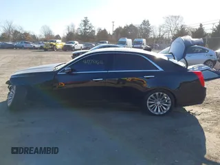 2019 Cadillac CTS Luxury AWD z VIN 1G6AX5SX8K0129858, wystawiony jako IAAI lot #41778164 z przebiegiem 89 695 mil mil oraz . Historia ofert i sprzedaży dostępna na DreamBid. Obrazek 14.