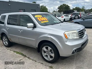 2012 Honda Pilot EX-L with VIN 5FNYF3H55CB018244, listed as a Copart auction lot 52822155 with 184,603 mi miles and Clean Title. Bid and sale history available at carsss.com. Image 1.