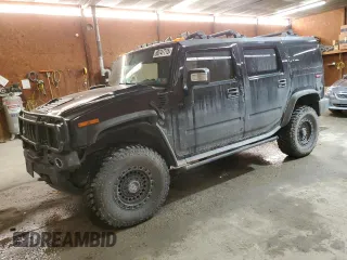 2006 Hummer H2 with VIN 5GRGN23U06H111389, listed as a Copart auction lot 88747715 with 182,628 mi miles and Salvage Title. Bid and sale history available at carsss.com. Image 1.
