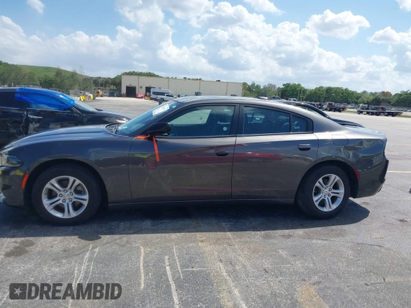 2023 Dodge Charger SXT with VIN 2C3CDXBG0PH571518, listed as a IAAI auction lot 42026774 with 47,394 mi miles and . Bid and sale history available at DreamBid. Image 14.