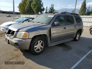 2006 GMC Envoy SLE with VIN 1GKES16SX66126259, listed as a Copart auction lot 74153124 with 159,897 mi miles and Clean Title. Bid and sale history available at DreamBid. Image 1.
