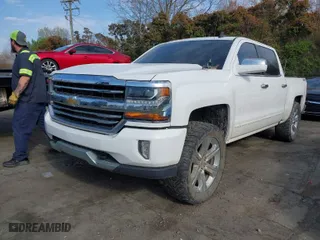 2016 Chevrolet Silverado 1500 LT with VIN 3GCUKREC0GG389084, listed as a IAAI auction lot 41913915 with 183,225 mi miles. Bid and sale history available at carsss.com. Image 2.