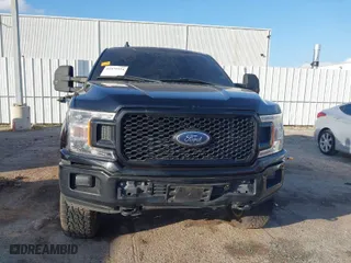 2020 Ford F-150 XL with VIN 1FTEW1E59LKE70874, listed as a IAAI auction lot 41479554 with 104,957 mi miles. Bid and sale history available at carsss.com. Image 12.