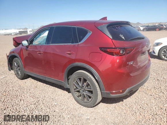 2017 Mazda CX-5 Grand Touring with VIN JM3KFBDL0H0118057, listed as a Copart auction lot 50121335 with 148,275 mi miles and Salvage Title. Bid and sale history available at carsss.com. Image 2.