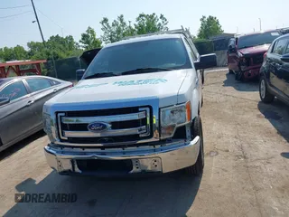 2014 Ford F-150 XL z VIN 1FTNF1CF2EKD83901, wystawiony jako IAAI lot #42436975 z przebiegiem 167 417 mil mil oraz . Historia ofert i sprzedaży dostępna na DreamBid. Obrazek 13.