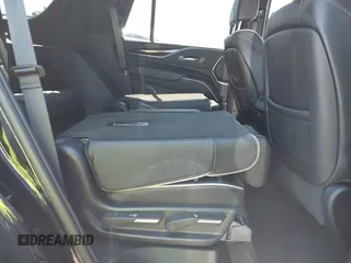 2023 Cadillac Escalade 4WD Premium Luxury with VIN 1GYS4BKL0PR409325, listed as a IAAI auction lot 41973567 with 32,398 mi miles and . Bid and sale history available at DreamBid. Image 8.