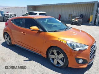 2015 Hyundai Veloster Turbo with VIN KMHTC6AE0FU220219, listed as a IAAI auction lot 42733381 with 133,729 mi miles and . Bid and sale history available at DreamBid. Image 1.