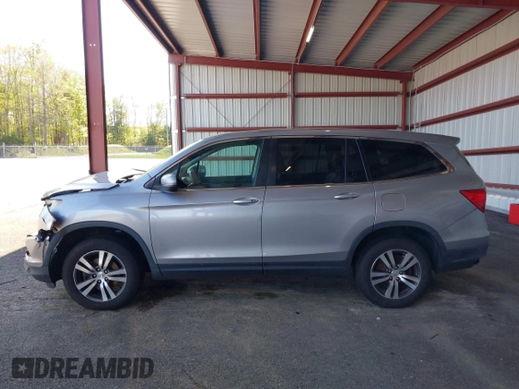 2017 Honda Pilot EX-L with VIN 5FNYF6H56HB063329, listed as a IAAI auction lot 42231498 with 179,695 mi miles and . Bid and sale history available at DreamBid. Image 14.