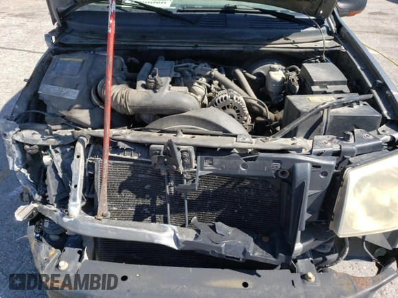 2005 GMC Envoy SLT z VIN 1GKET16M356134877, wystawiony jako Copart lot #57333345 z przebiegiem 205 714 mil mil oraz Szkoda całkowita • Salvage title. Historia ofert i sprzedaży dostępna na DreamBid. Obrazek 11.