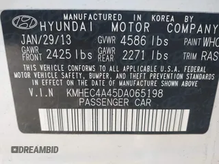 2013 Hyundai Sonata Hybrid with VIN KMHEC4A45DA065198, listed as a IAAI auction lot 42137511 with 219,500 mi miles. Bid and sale history available at carsss.com. Image 9.