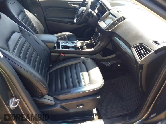 2019 Ford Edge SEL with VIN 2FMPK4J91KBC13436, listed as a IAAI auction lot 42551782 with 77,164 mi miles and . Bid and sale history available at DreamBid. Image 5.