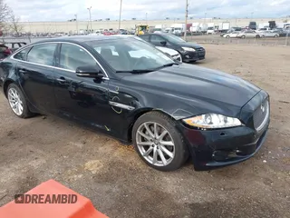 2011 Jaguar XJ with VIN SAJWA2GB3BLV05690, listed as a IAAI auction lot 41691432 with 148,895 mi miles. Bid and sale history available at carsss.com. Image 1.