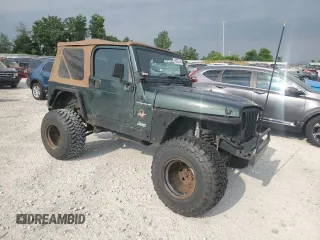 2002 Jeep Wrangler Sahara with VIN 1J4FA59S02P729015, listed as a Copart auction lot 63525745 with Not provided miles and Clean title. Bid and sale history available at DreamBid. Image 4.