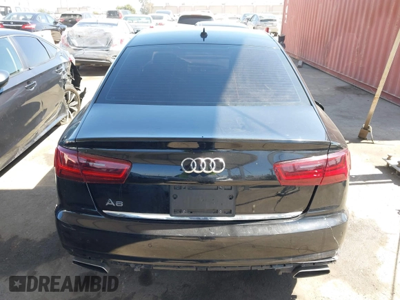 2016 Audi A6 Premium with VIN WAUCFAFC7GN162981, listed as a IAAI auction lot 42660005 with 148,038 mi miles and . Bid and sale history available at DreamBid. Image 16.