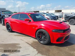 2021 Dodge Charger Scat Pack Widebody with VIN 2C3CDXGJ3MH546290, listed as a IAAI auction lot 40371989 with 34,950 mi miles. Bid and sale history available at carsss.com. Image 1.